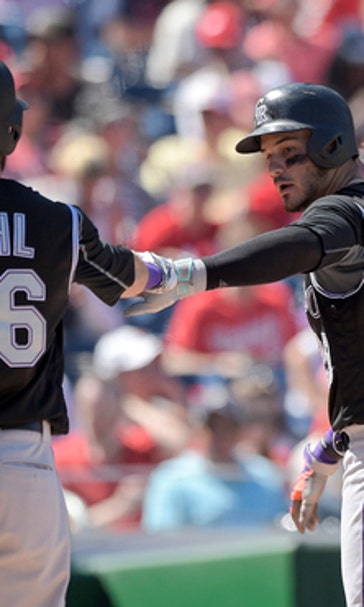 Arenado homers among 4 hits to power Rockies past